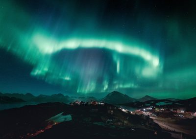 Greenland; Northern sky disco over Kulusuk. Photo by Norris Niman - Visit Greenland